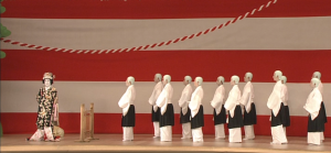 二人道成寺の所化と花子の問答場面